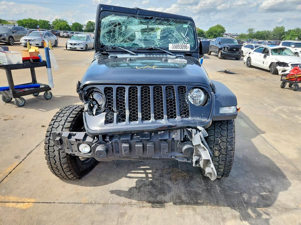 2023 Jeep Gladiator VIN 1C6HJTAG0PL584624 COPART salvage auction — ALL OVER, Tx - Certificate Of Title, sold $12,700 on 2026-07-30 (photo 5)