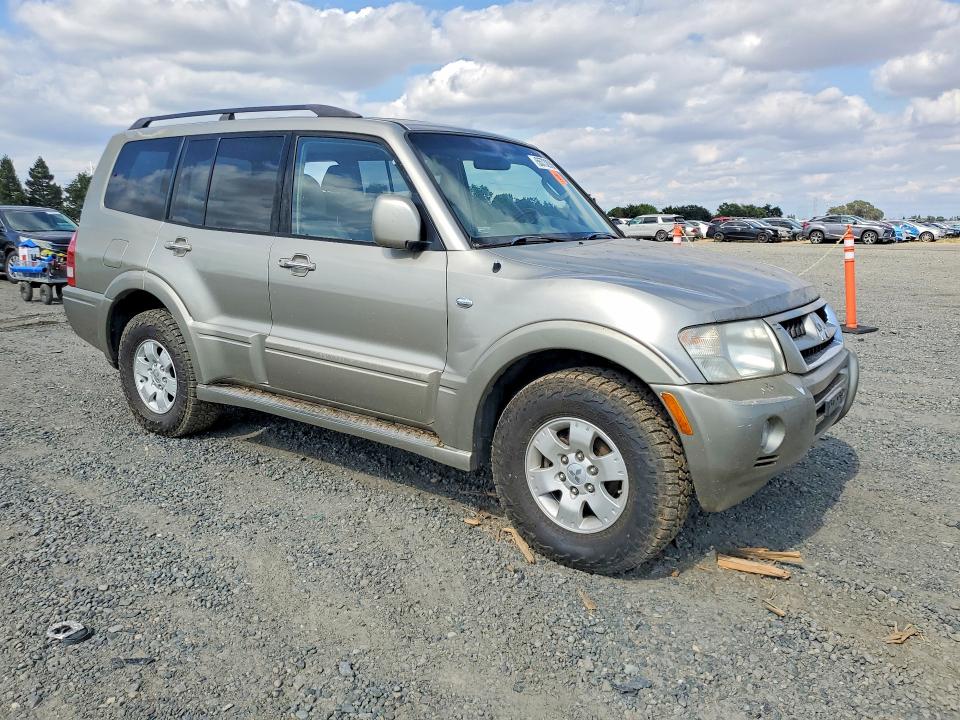 2004 Mitsubishi Montero VIN JA4MW51S04J009224 COPART salvage auction — REAR END, CA - DIS/DLR/EXP ONLY CLEAN TITLE, sold $10 on 2026-09-03 (photo 4)