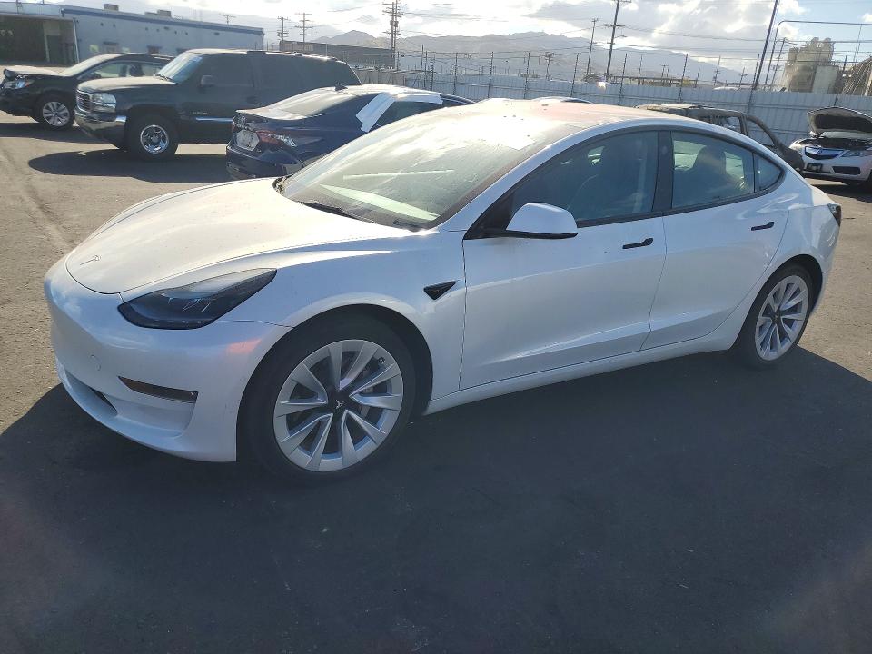 2022 Tesla Model 3 VIN 5YJ3E1EB8NF137548 COPART salvage auction — MINOR DENT/SCRATCHES, Ca - Salvage Certificate, sold $14,400 on 2026-07-06 (photo 1)