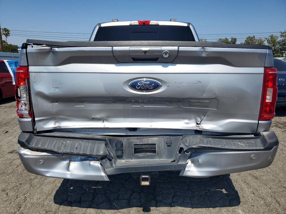 2023 Ford F-150 lightning VIN 1FTFW1ED3PFA04593 COPART salvage auction — REAR END, Mt - Salvage Certificate Of A Vehic, sold $19,400 on 2026-07-09 (photo 6)