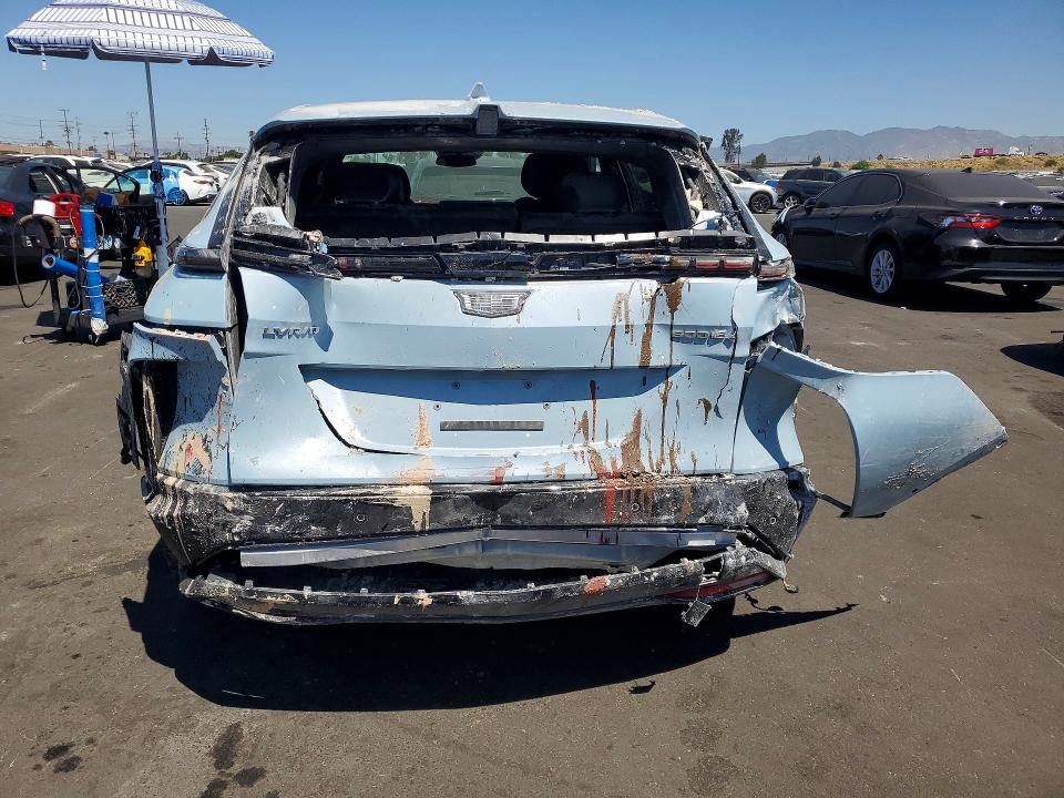 2025 Cadillac Lyriq VIN 1GYKPURL6SZ301910 COPART salvage auction — REAR END, Ca - Salvage Certificate, sold $14,100 on 2026-07-06 (photo 6)