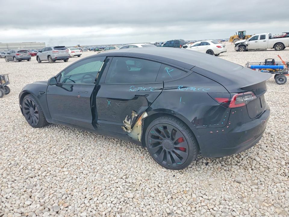 2022 Tesla VIN 5YJ3E1EC0NF293933 COPART salvage auction — SIDE, Tx - Salvage Vehicle Title, sold $10,000 on 2026-07-02 (photo 2)