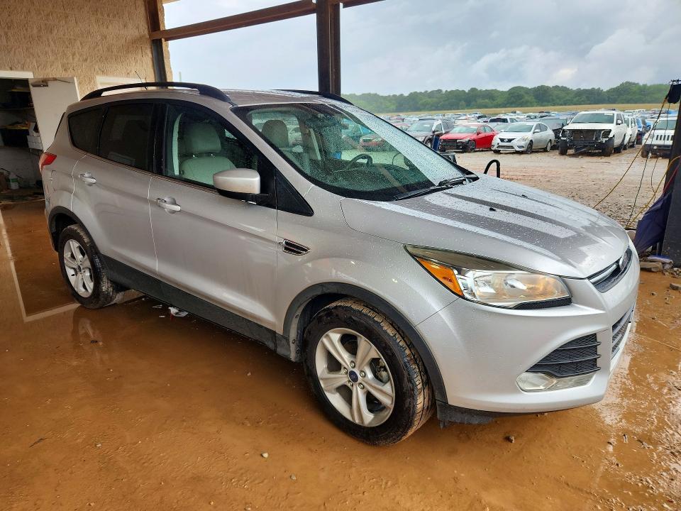 2014 Ford VIN 1FMCU0GX7EUC81553 COPART salvage auction — MINOR DENT/SCRATCHES, Al - Certificate Of Title, sold $700 on 2026-07-29 (photo 4)