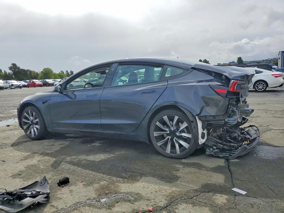 2024 Tesla Model 3 VIN 5YJ3E1EA8RF743011 COPART salvage auction — REAR END, CA - SALVAGE CERTIFICATE, sold $9,100 on 2026-07-24 (photo 2)