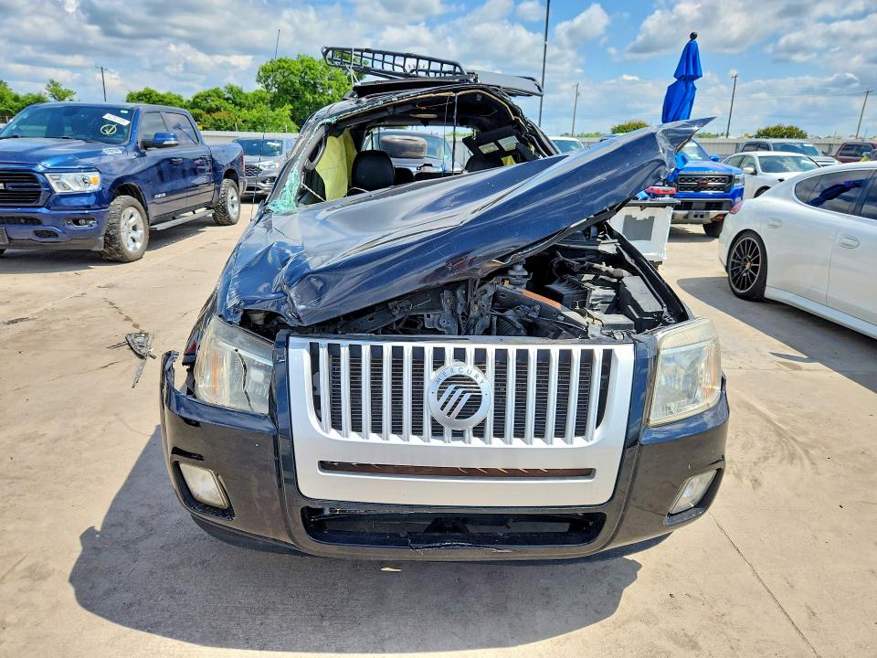 2010 Mercury Mariner VIN 4M2CN9H70AKJ04623 COPART salvage auction — ROLLOVER, Tx - Salvage Vehicle Title, sold $250 on 2026-07-02 (photo 5)