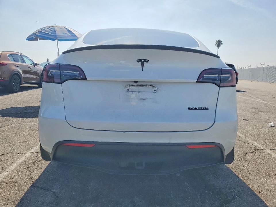 2023 Tesla Model y VIN 7SAYGDEF4PF762717 COPART salvage auction — SIDE, Ca - Salvage Certificate, sold $13,000 on 2026-07-31 (photo 6)