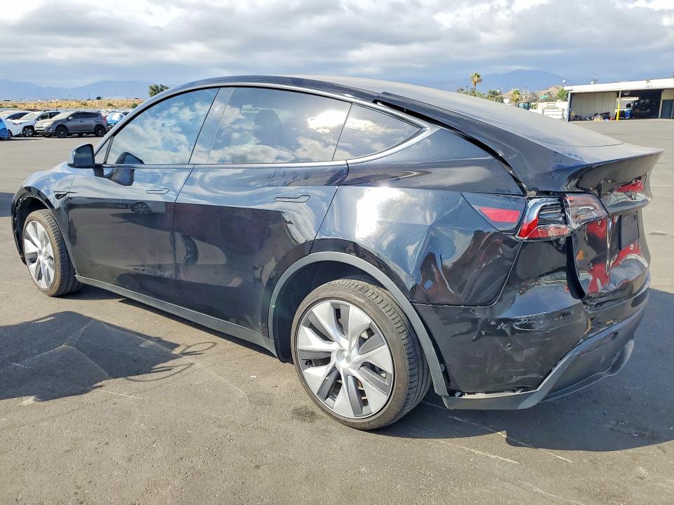 2023 Tesla Model y VIN 7SAYGDEE6PA208714 COPART salvage auction — REAR END, Ca - Salvage Certificate, sold $11,700 on 2026-07-20 (photo 2)