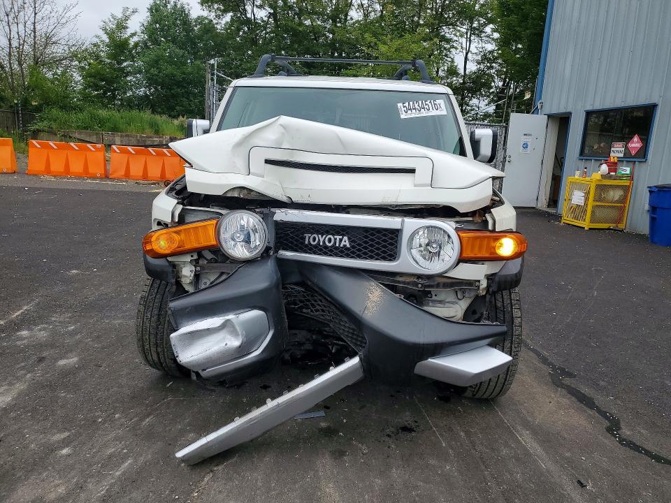 2014 Toyota Fj cruiser VIN JTEBU4BF0EK182599 COPART salvage auction — FRONT END, Or - Salvage Title Certificate, sold $9,100 on 2026-07-20 (photo 5)