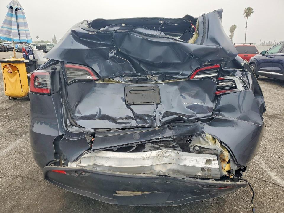 2023 Tesla Model y VIN 7SAYGDEE9PA113967 COPART salvage auction — REAR END, Ca - Salvage Certificate, sold $7,500 on 2026-07-17 (photo 6)