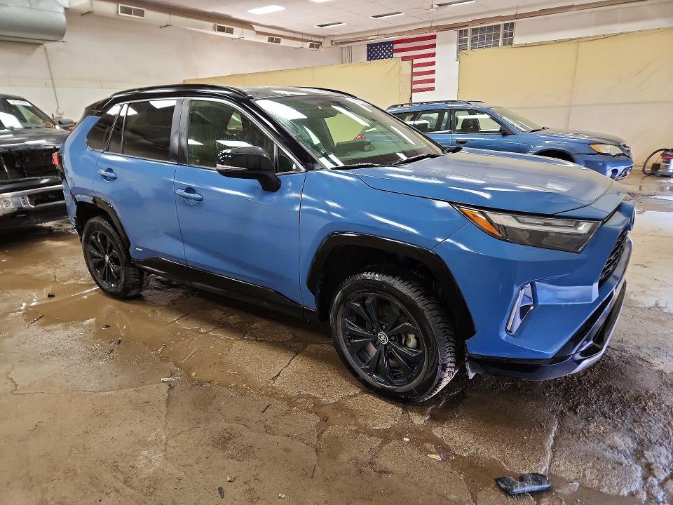 2023 Toyota Rav 4 VIN JTME6RFV2PJ040113 COPART salvage auction — REAR END, MI - CERTIFICATE OF TITLE, sold $14,100 on 2026-07-22 (photo 4)