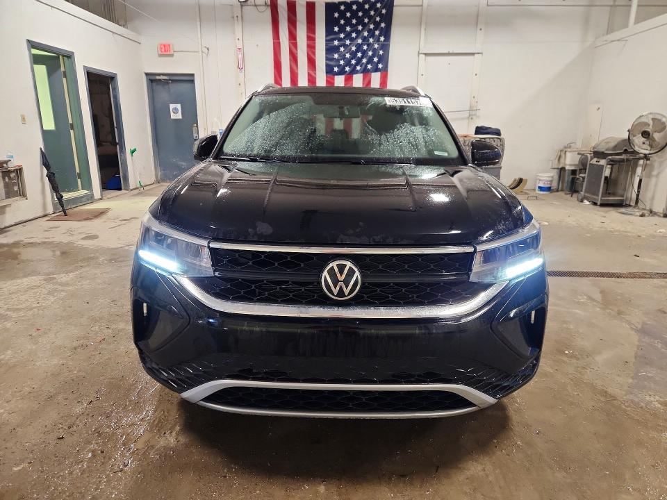 2022 Volkswagen Taos VIN 3VVLX7B2XNM056811 COPART salvage auction — REAR END, IN - CERTIFICATE OF TITLE, sold $8,100 on 2026-08-20 (photo 5)