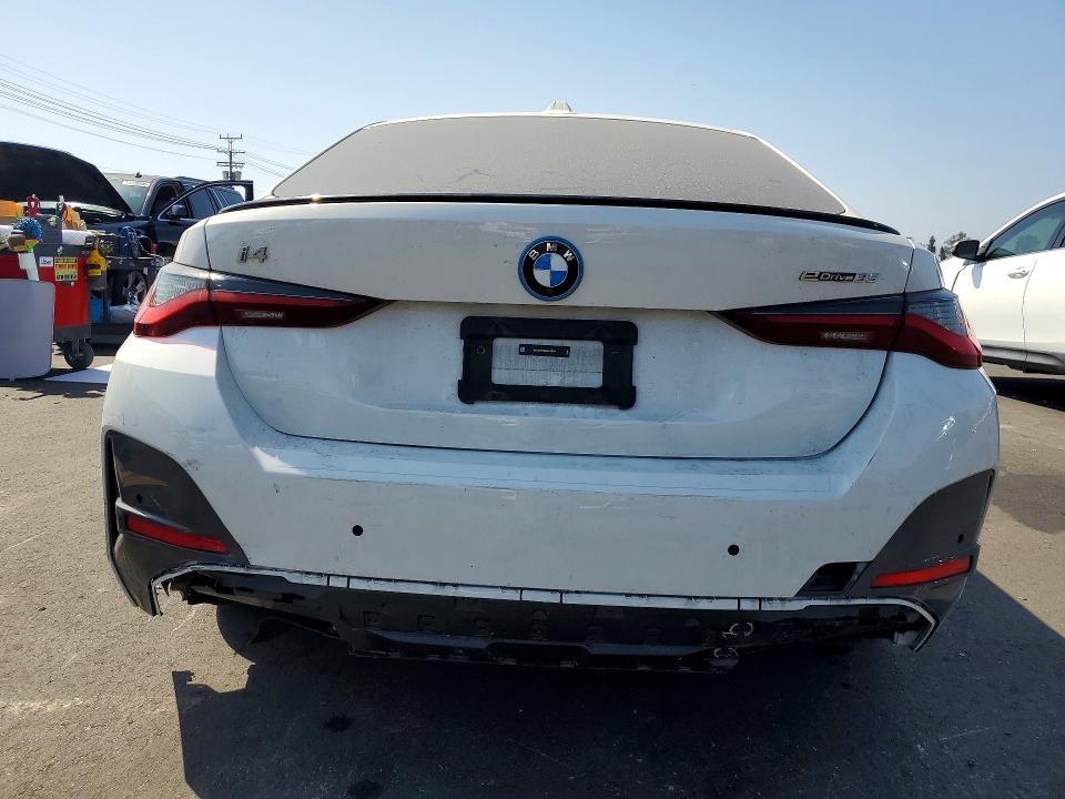2024 BMW VIN WBY43AW06RFS63074 COPART salvage auction — REAR END, Ca - Salvage Certificate, sold $17,400 on 2026-07-29 (photo 6)