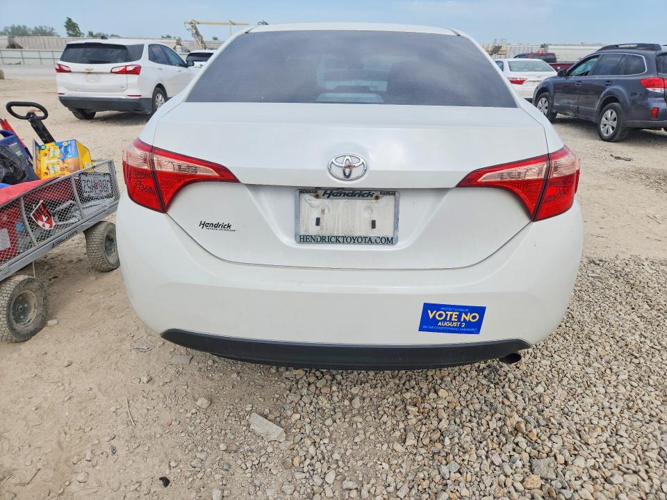 2017 Toyota Corolla VIN 5YFBURHE4HP733946 COPART salvage auction — SIDE, Ks - Cert Of Title-Salvage, sold $4,400 on 2026-07-09 (photo 6)