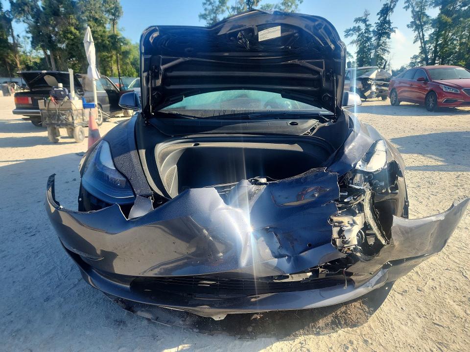 2022 Tesla Model 3 VIN 5YJ3E1EB8NF251162 COPART salvage auction — FRONT END, Fl - Cert Of Title Slvg Rebuildable, sold $6,900 on 2026-07-21 (photo 5)
