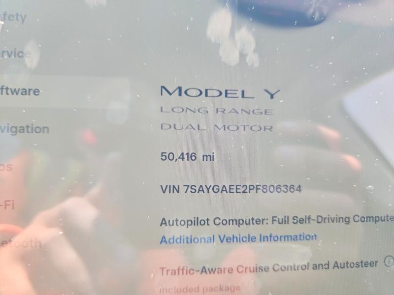 2023 Tesla VIN 7SAYGAEE2PF806364 COPART salvage auction — FRONT END, TX - SALVAGE VEHICLE TITLE, sold $2,500 on 2026-07-24 (photo 9)