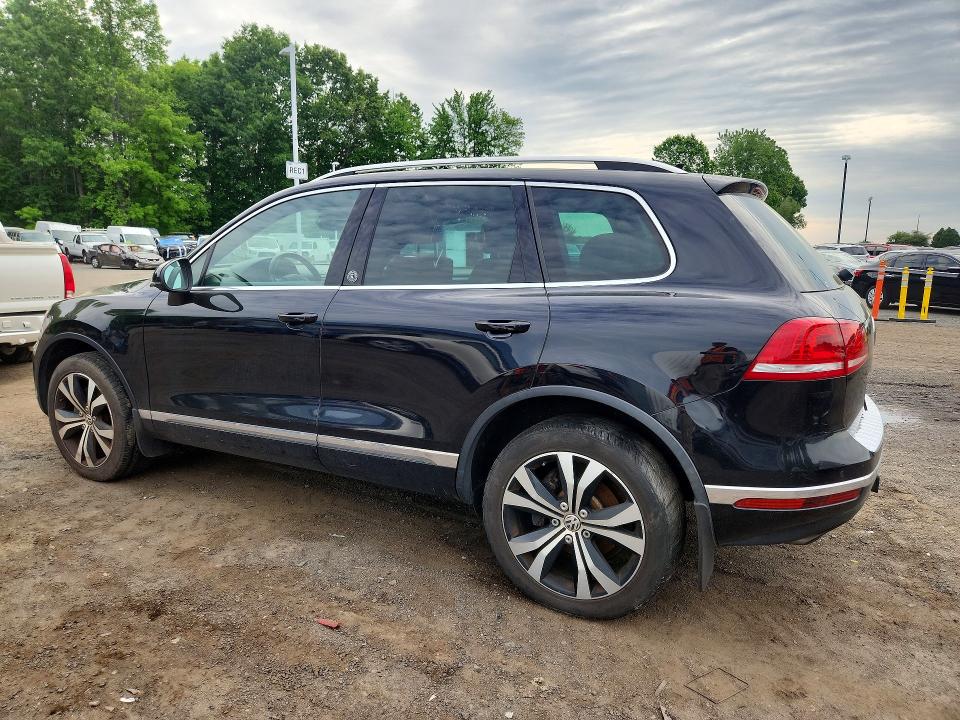 2017 Volkswagen Touareg VIN WVGRF7BP9HD000586 COPART salvage auction — MINOR DENT/SCRATCHES, Mi - Certificate Of Title, sold $3,850 on 2026-07-09 (photo 2)