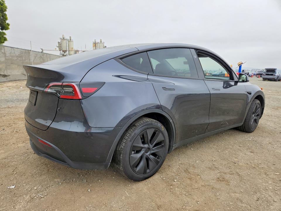 2025 Tesla Model y VIN 7SAYGDED0SF253523 COPART salvage auction — SIDE, Ca - Salvage Certificate, sold $13,600 on 2026-07-24 (photo 3)