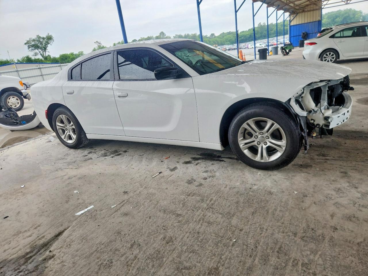 2023 Dodge Charger VIN 2C3CDXBG7PH559799 COPART salvage auction — Front End, GA - CERT OF TITLE-SALVAGE, sold $6,900 on 2026-07-10 (photo 1)