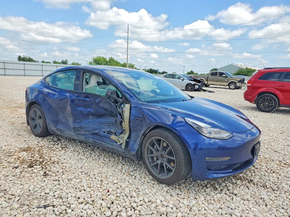 2021 Tesla Model 3 VIN 5YJ3E1EB8MF961001 COPART salvage auction — SIDE, Tx - Salvage Vehicle Title, sold $2,550 on 2026-07-23 (photo 4)