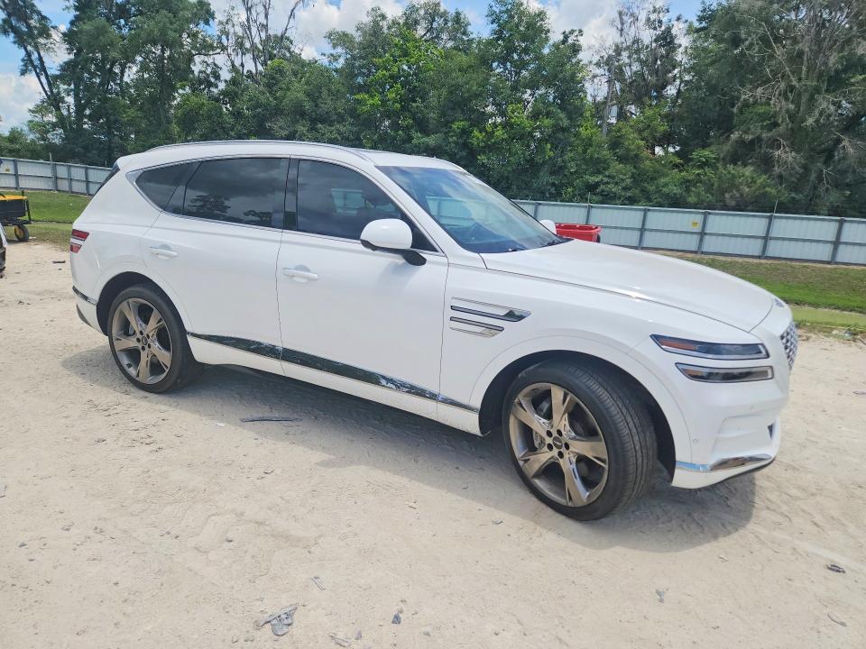 2023 Genesis VIN KMUHBDSB9PU121774 COPART salvage auction — SIDE, Salvage Title, sold $7,000 on 2026-07-21 (photo 4)