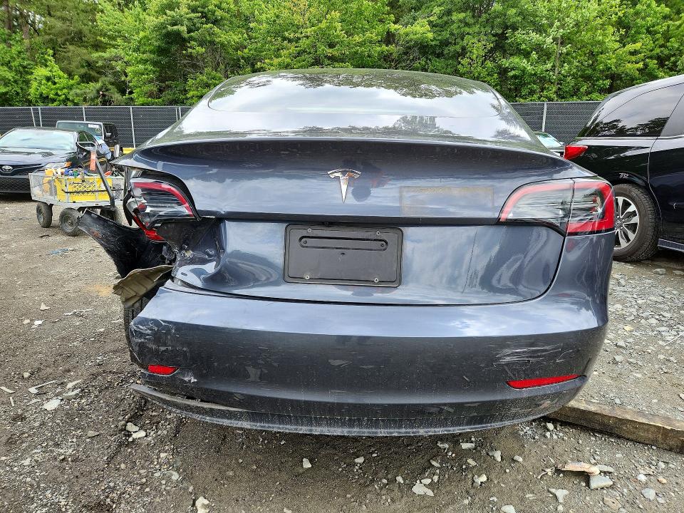 2023 Tesla Model 3 VIN 5YJ3E1EA6PF668533 COPART salvage auction — REAR END, Md - Cert Of Salvage > 75% Damage, sold $5,100 on 2026-07-14 (photo 6)