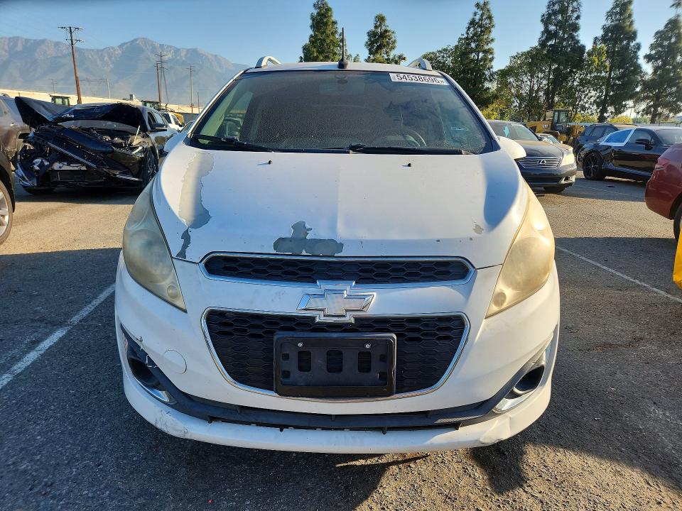 2013 Chevrolet VIN KL8CF6S97DC519909 COPART salvage auction — NORMAL WEAR, Ca - Salvage Certificate, sold $200 on 2026-07-02 (photo 5)