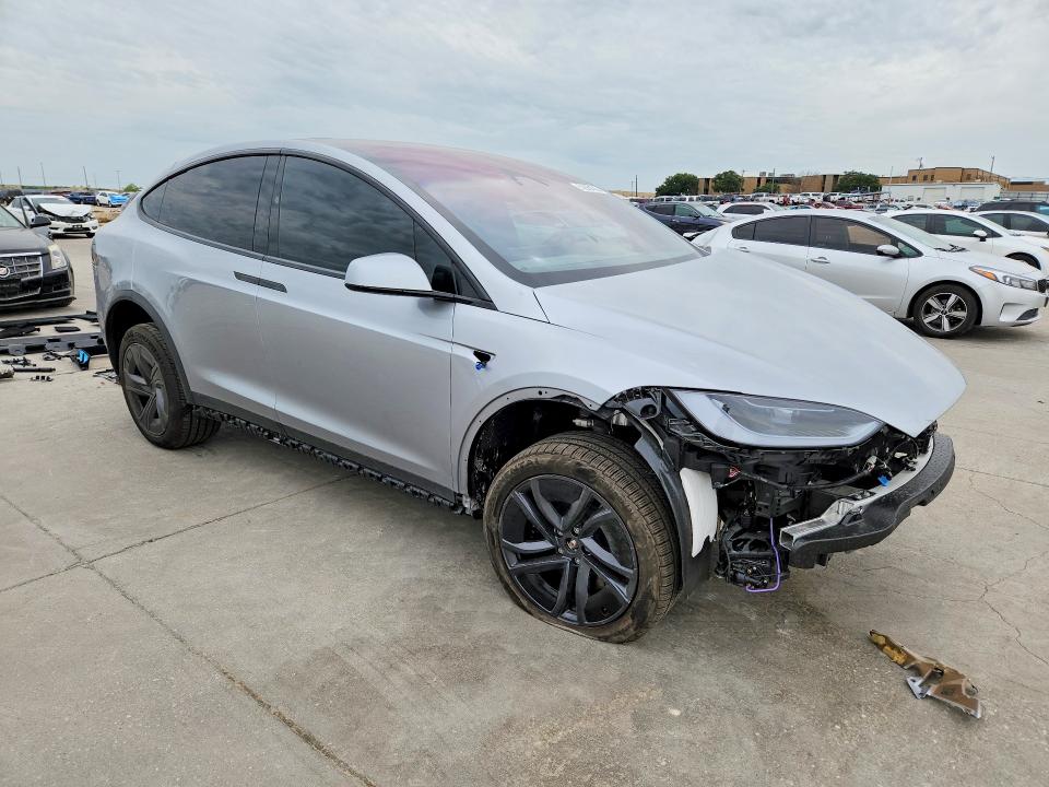 2026 Tesla VIN 7SAXCBE54TF480395 COPART salvage auction — FRONT END, Tx - Certificate Of Title, sold $42,000 on 2026-07-02 (photo 4)
