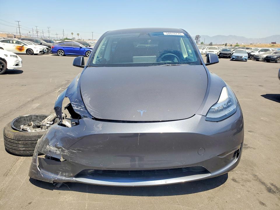 2022 Tesla Model y VIN 7SAYGAEEXNF400989 COPART salvage auction — FRONT END, Ca - Salvage Certificate, sold $9,600 on 2026-07-13 (photo 5)