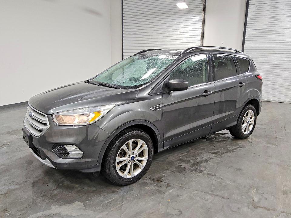 2018 Ford Escape VIN 1FMCU9GD1JUC10675 COPART salvage auction — MINOR DENT/SCRATCHES, MA - CERTIFICATE OF TITLE, sold $1,500 on 2026-07-09 (photo 1)