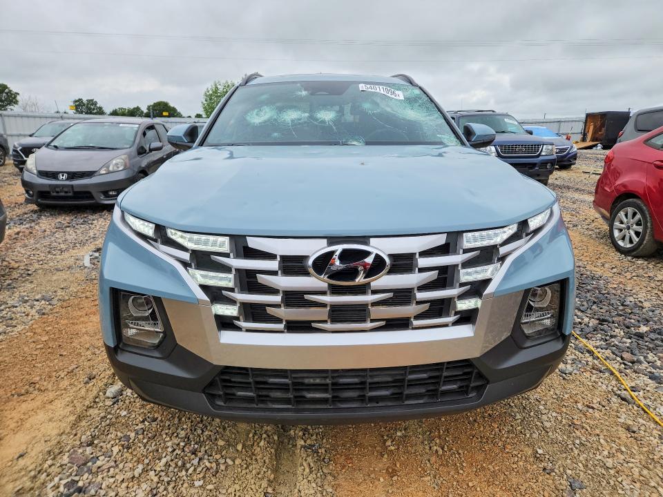 2023 Hyundai Santa cruz VIN 5NTJC4AE6PH061980 COPART salvage auction — HAIL, Mo - Certificate Of Title, sold $8,500 on 2026-07-08 (photo 5)