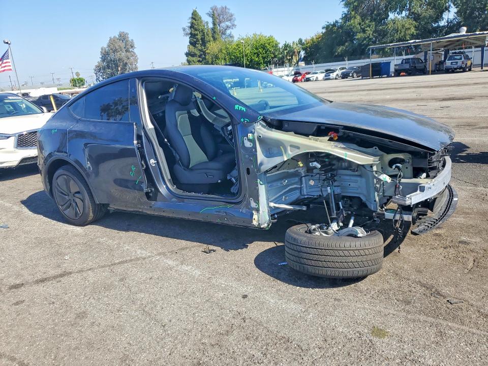 2026 Tesla Model y VIN 7SAYGDED0TF388700 COPART salvage auction — UNDERCARRIAGE, CA - SALVAGE CERTIFICATE, sold $17,200 on 2026-07-31 (photo 4)