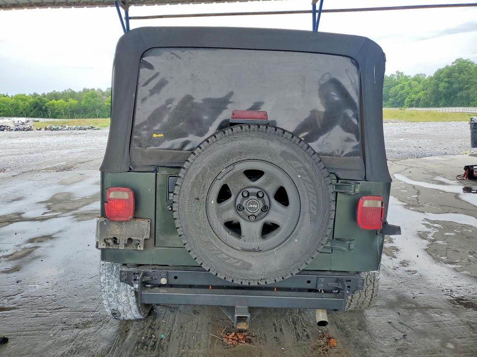 1995 Jeep Wrangler / VIN 1J4FY19P3SP313282 COPART salvage auction — ROLLOVER, GA - CERT OF TITLE-SALVAGE, sold $400 on 2026-07-02 (photo 6)