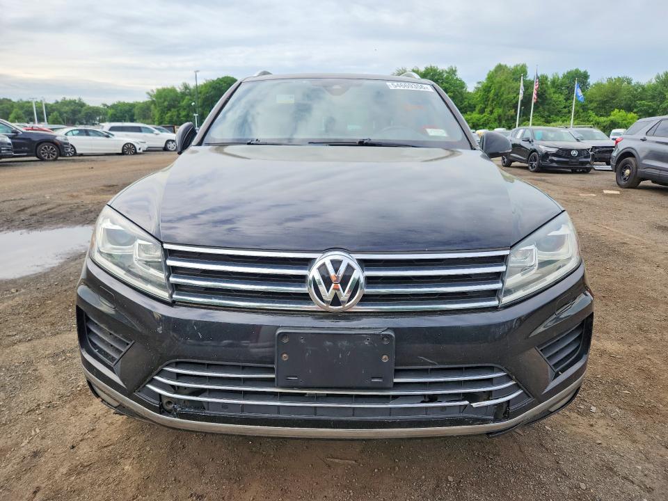 2017 Volkswagen Touareg VIN WVGRF7BP9HD000586 COPART salvage auction — MINOR DENT/SCRATCHES, Mi - Certificate Of Title, sold $3,850 on 2026-07-09 (photo 5)