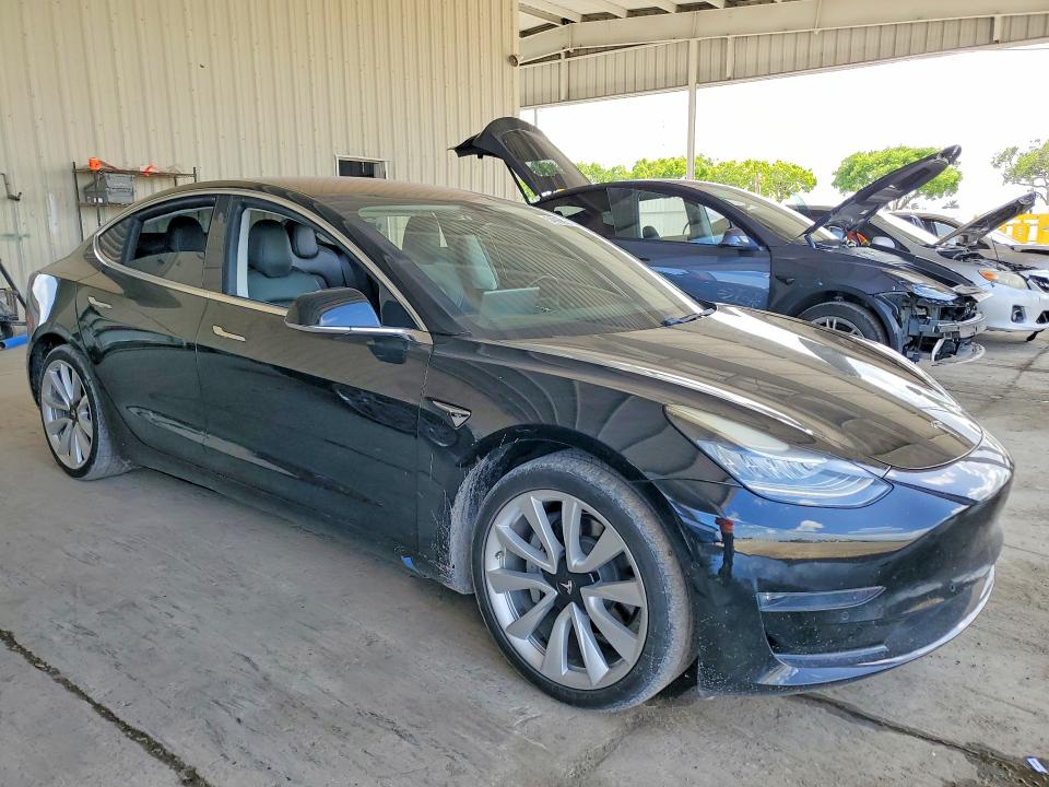 2018 Tesla Model 3 VIN 5YJ3E1EA2JF175763 COPART salvage auction — SIDE, FL - CERT OF TITLE SLVG REBUILDABLE, sold $4,550 on 2026-07-29 (photo 4)
