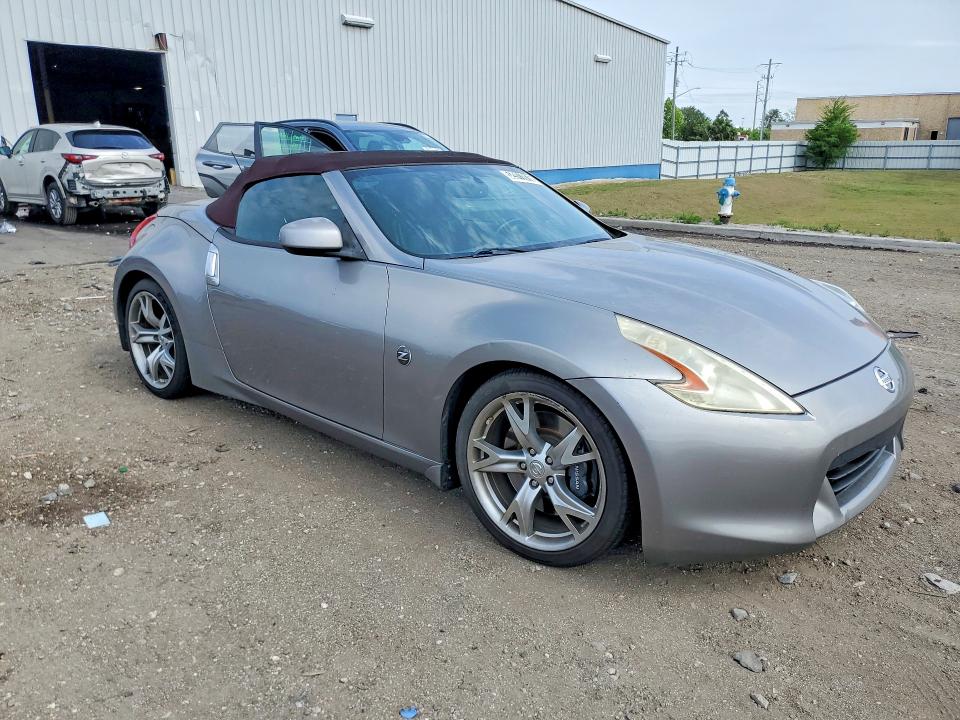 2010 Nissan 370z VIN JN1AZ4FHXAM303850 COPART salvage auction — MINOR DENT/SCRATCHES, Fl - Certificate Of Title, sold $500 on 2026-07-30 (photo 4)