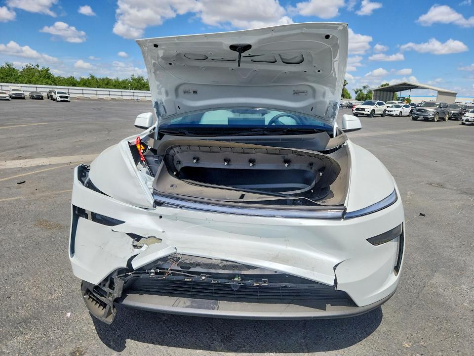 2026 Tesla Model y VIN 7SAYGDED2TF585321 COPART salvage auction — FRONT END, Ca - Salvage Certificate, sold $19,100 on 2026-07-13 (photo 5)