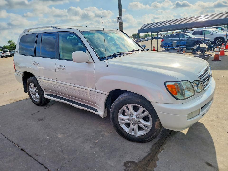 2004 Lexus Lx 470 VIN JTJHT00W143540053 COPART salvage auction — NORMAL WEAR, Mn - Certificate Of Title, sold $7,500 on 2026-07-07 (photo 4)