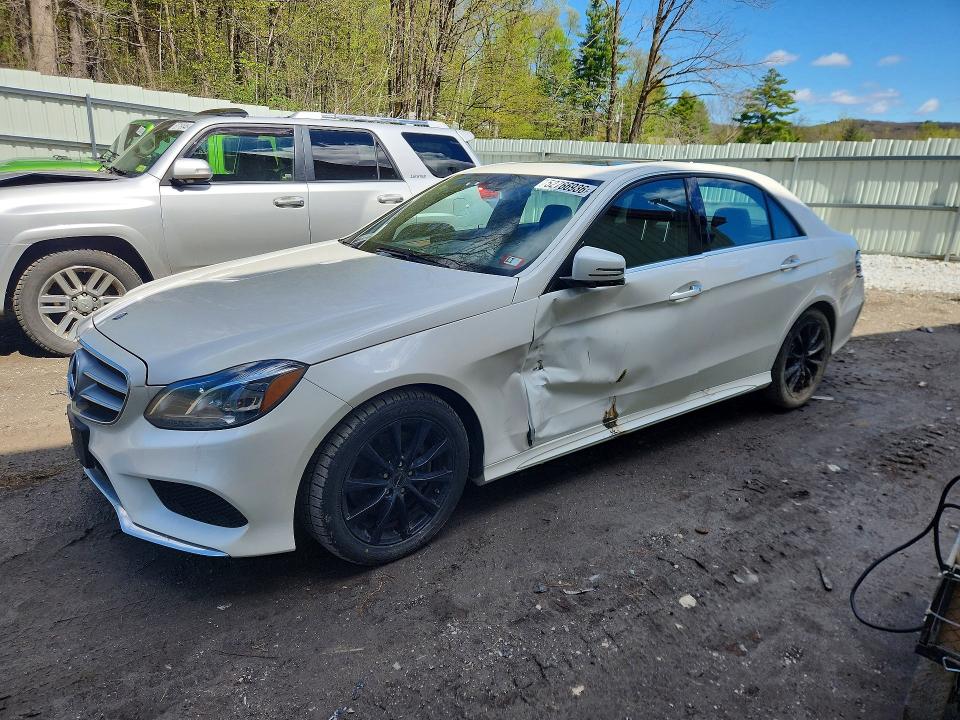 2014 Mercedes-benz E-klasse VIN WDDHF8JB4EA816216 COPART salvage auction — SIDE, NH - CERT OF TITLE-SALVAGE, sold $700 on 2026-07-27 (photo 1)