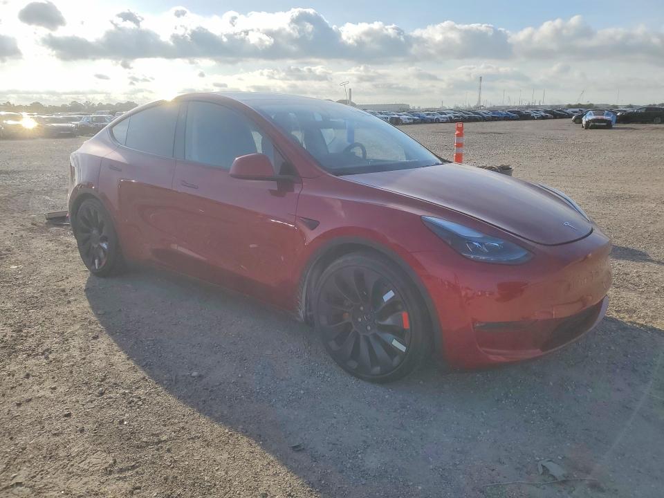 2024 Tesla Model y VIN 7SAYGDEF7RA313080 COPART salvage auction — SIDE, Tx - Salvage Vehicle Title, sold $11,600 on 2026-07-13 (photo 4)