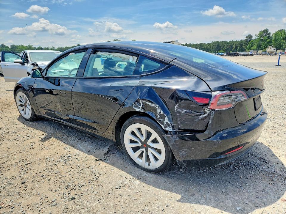 2023 Tesla Model 3 VIN 5YJ3E1EA9PF616085 COPART salvage auction — SIDE, Nc - Salvage Certificate Of Title, sold $7,000 on 2026-07-27 (photo 2)