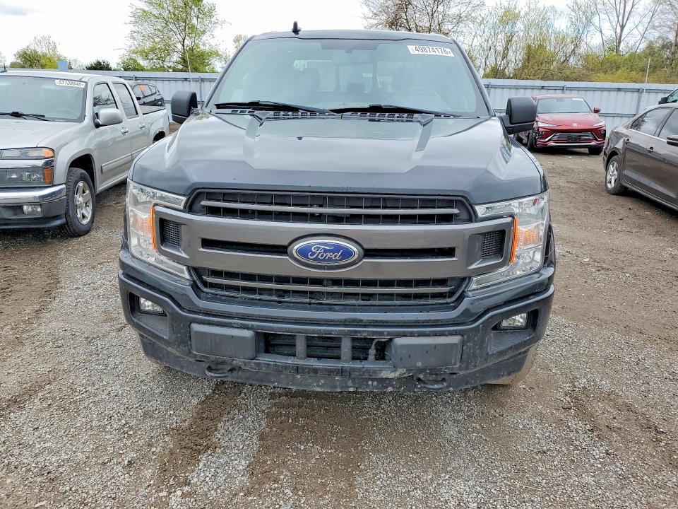 2018 Ford F-150 lightning VIN 1FTFW1EG1JFC35400 COPART salvage auction — VANDALISM, On - Permit Rebuilt - Unfit, sold $10,600 on 2026-07-03 (photo 5)