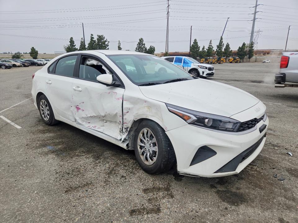 2024 Kia Forte VIN 3KPF24AD8RE784848 COPART salvage auction — SIDE, Ca - Salvage Certificate, sold $4,950 on 2026-07-02 (photo 4)