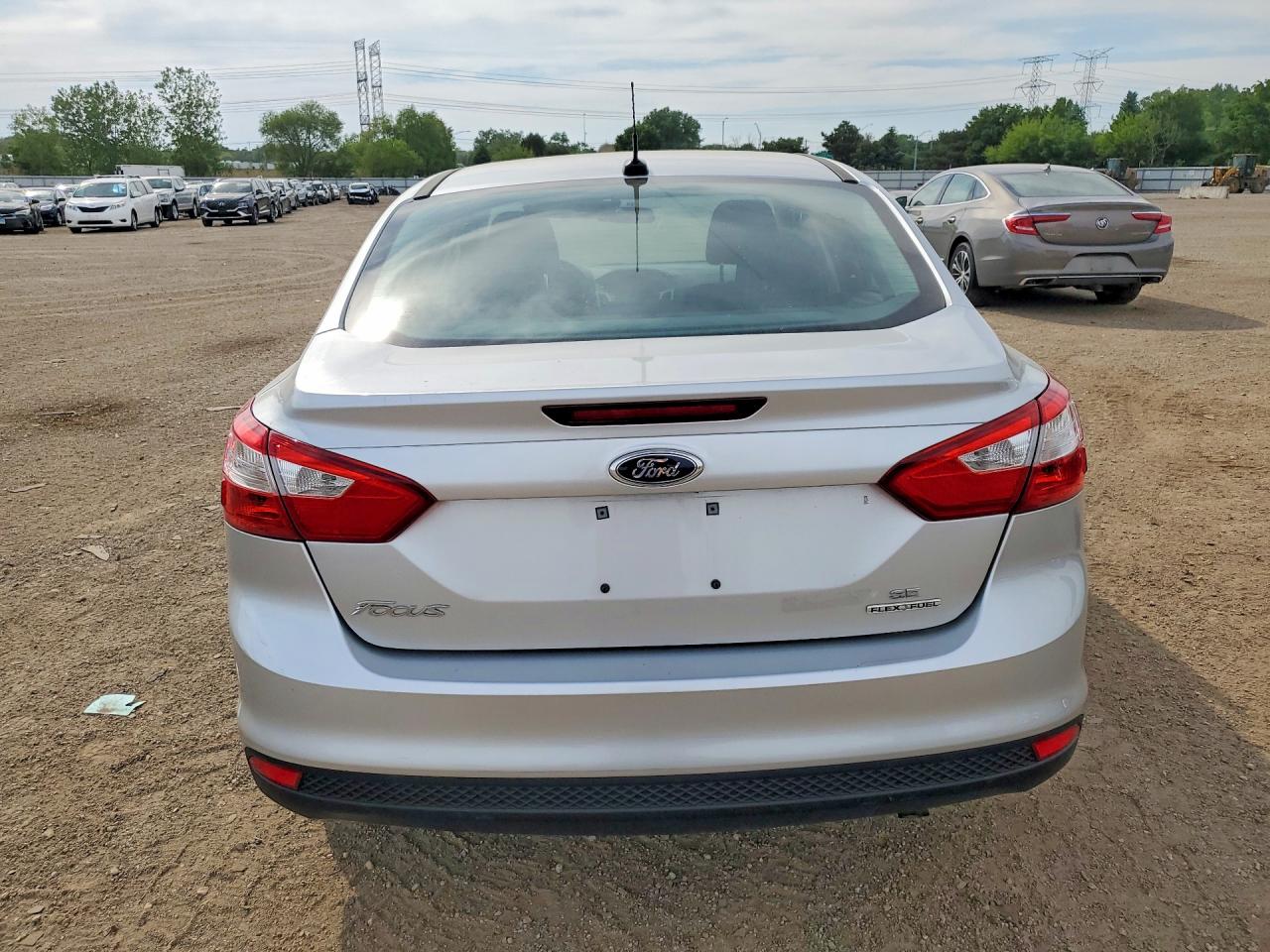 2014 Ford Focus VIN 1FADP3F25EL410991 COPART salvage auction — Side, IL - SALVAGE CERTIFICATE, sold $725 on 2026-06-30 (photo 6)