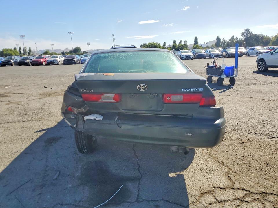 1999 Toyota Camry VIN JT2BG22K5X0309304 COPART salvage auction — REAR END, CA - SALVAGE CERTIFICATE, sold $150 on 2026-07-06 (photo 6)