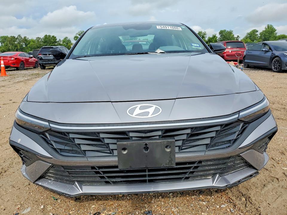 2025 Hyundai VIN KMHLM4DG9SU964622 COPART salvage auction — SIDE, Tx - Salvage Vehicle Title, sold $6,900 on 2026-07-24 (photo 5)