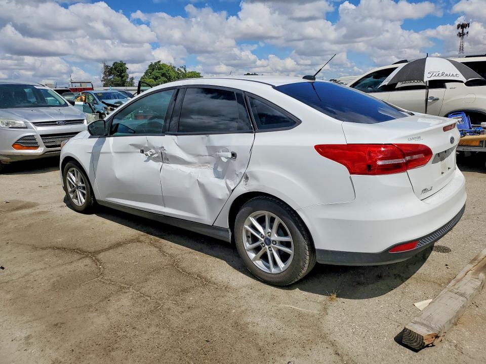 2017 Ford Focus VIN 1FADP3F28HL223183 COPART salvage auction — SIDE, Salvage Title, sold $800 on 2026-07-10 (photo 2)