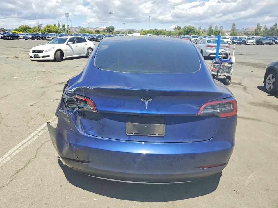 2023 Tesla Model 3 VIN 5YJ3E1EA9PF653783 COPART salvage auction — REAR END, Ca - Salvage Certificate, sold $6,100 on 2026-07-17 (photo 6)