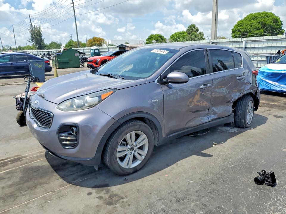 2018 Kia Sportage VIN KNDPMCAC9J7370546 COPART salvage auction — SIDE, FL - CERT OF TITLE SLVG REBUILDABLE, sold $2,700 on 2026-07-15 (photo 1)