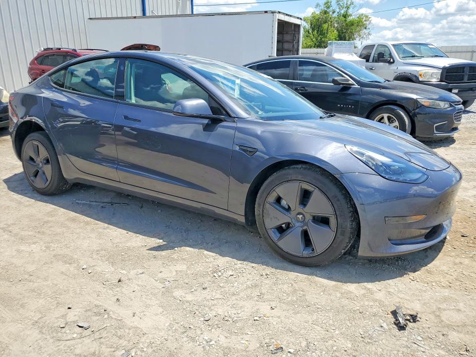 2023 Tesla Model 3 VIN 5YJ3E1EA6PF417415 COPART salvage auction — FRONT END, Fl - Cert Of Title Slvg Rebuildable, sold $8,300 on 2026-07-31 (photo 4)