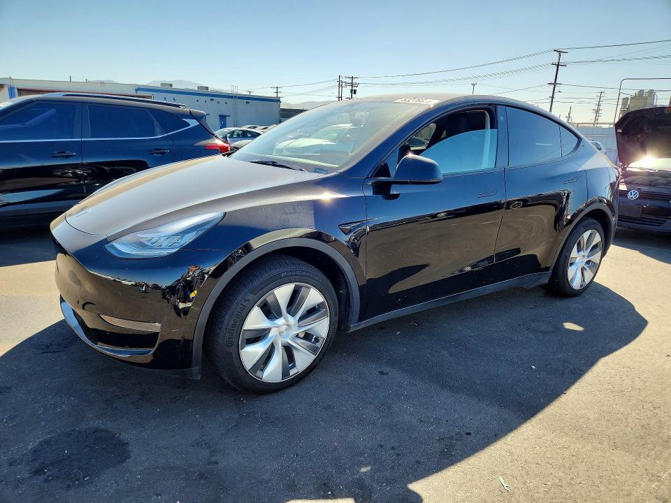 2023 Tesla Model 3 VIN 7SAYGDEE0PA061595 COPART salvage auction — SIDE, Salvage Title, sold $250 on 2026-08-03 (photo 1)